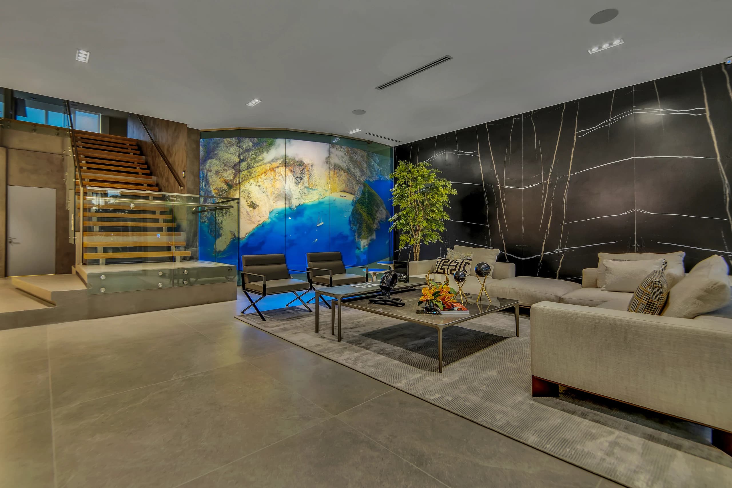 Lounge, artwork and stair at 391 Holiday Drive