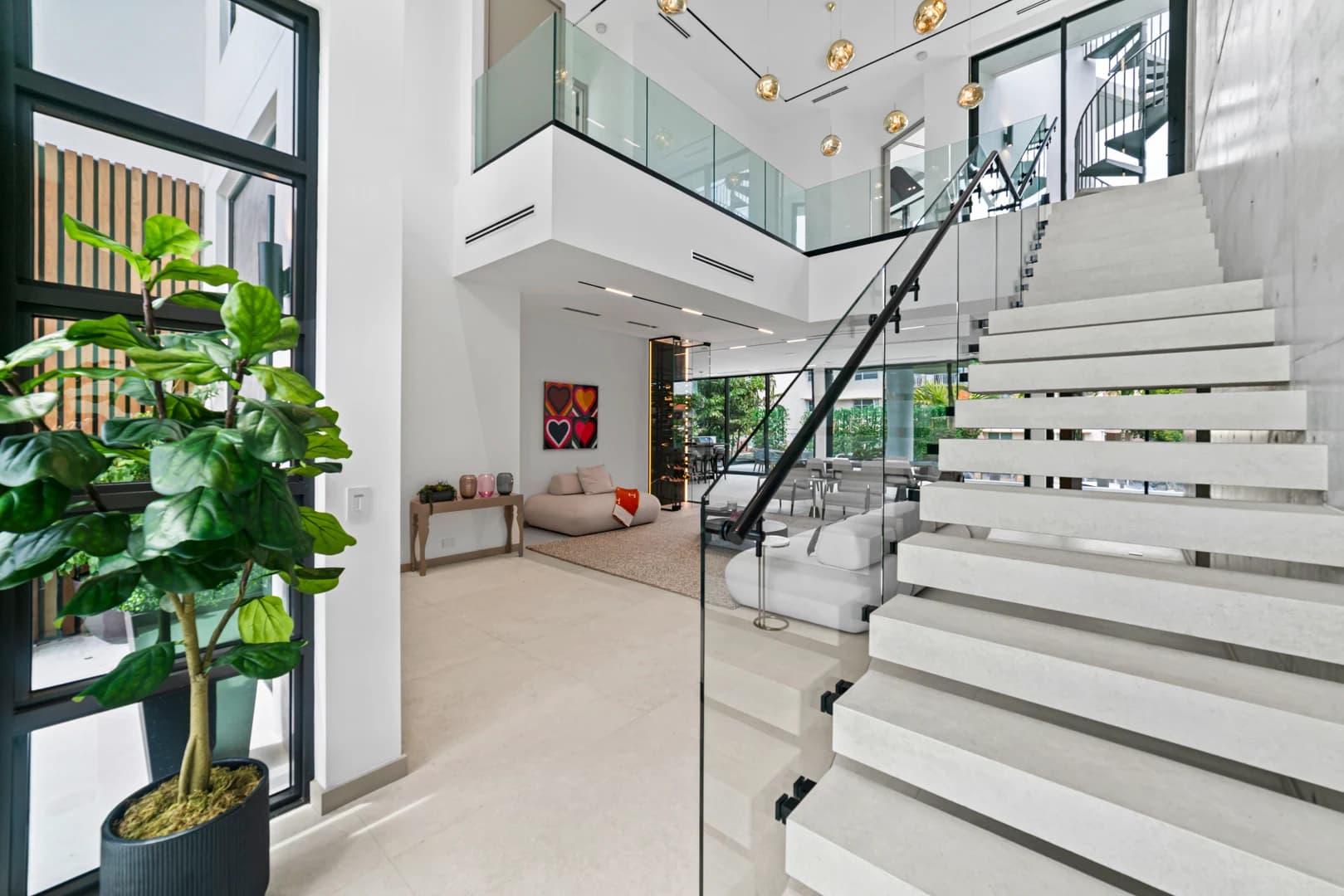 Entry and floating staircase at 1379 NE 104 Street
