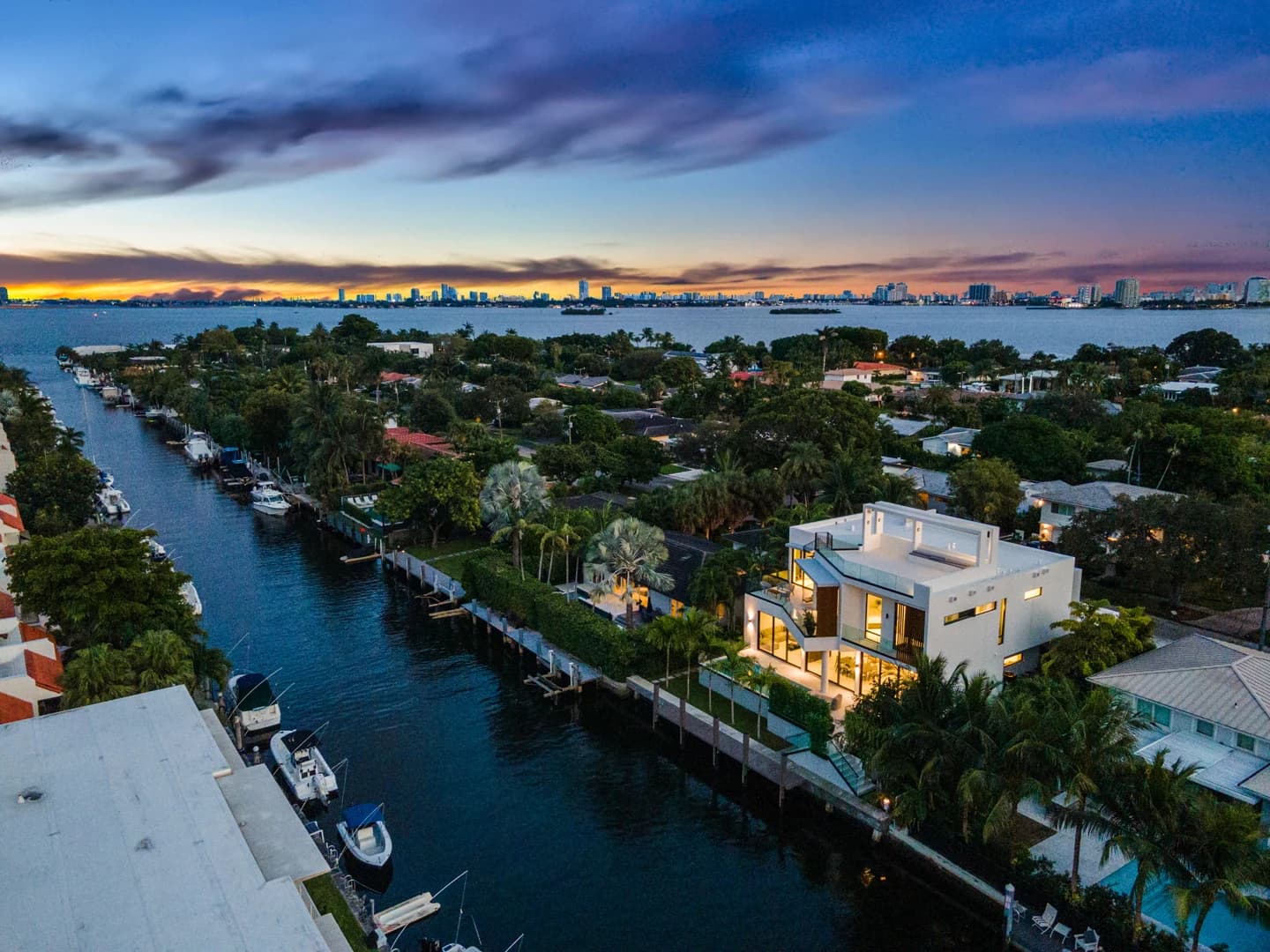 Aerial waterfront view at sunset over 1379 NE 104 Street